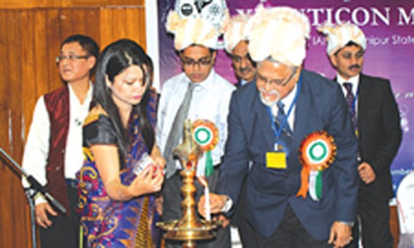 Ceremonial lamp being lit up at the opening function of 11th Cuticon, 2014 at JNIMS conference hall