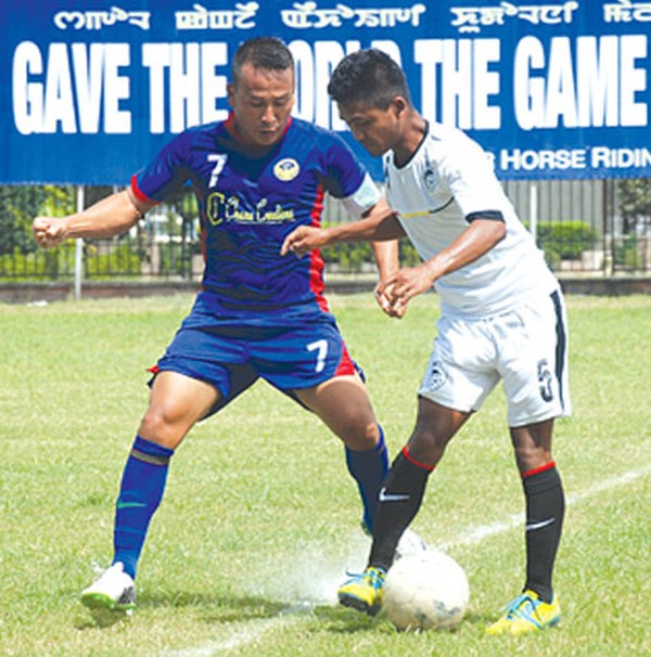 NISA (white) and ZFC (blue) players fights for the ball