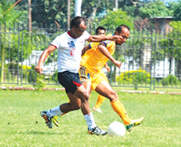 NISA (white) and SSU players challenge for the ball possession