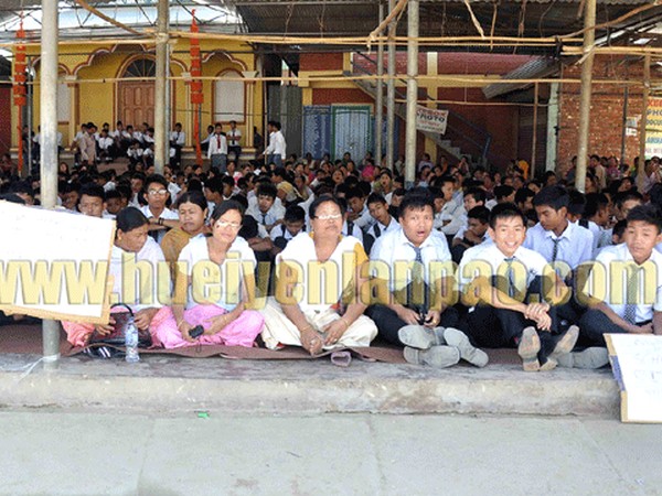 A sit-in demonstration  at Ibudhou Naohallai Laibung at Kakching Market in Thoubal district