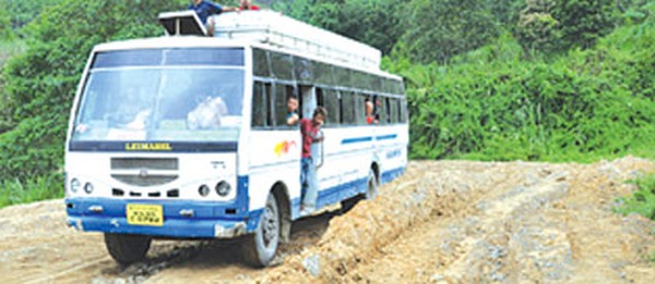 File pic of a bus making its way through the Imphal-Jiri line