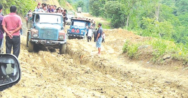 Vehicles make their way through Imphal-Jiribam line