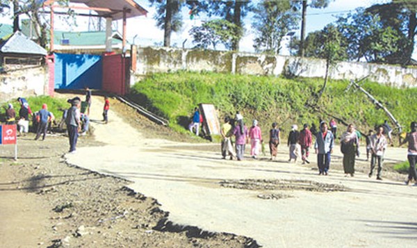 Ukhrul denizens walk the road near the DC quarters