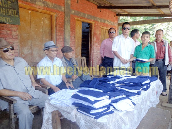 School uniforms distributed at Champhai village in Saikul