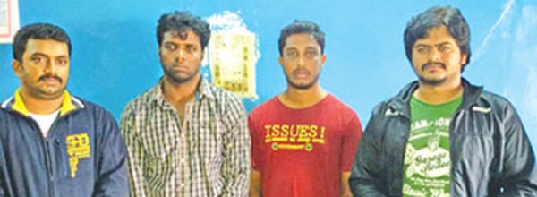 The four assailants in police custody