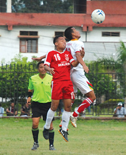 TRAU (white) and TRUGPU players battle for the ball
