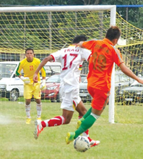 TRAU (white) and NEROCA players battle for ball possession