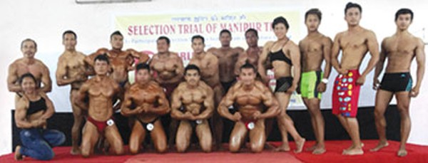 The selected body builders pose for the lens