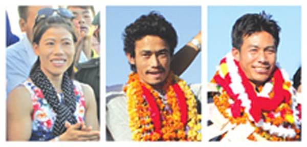 The three gold medallists at Imphal airport