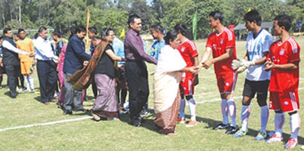 Dignitaries inspecting players of the opening match