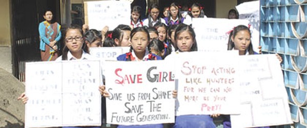 Young students staging a protest at their school 