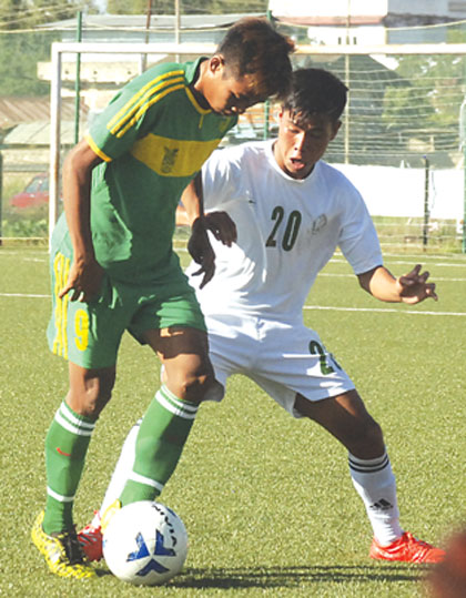 YPHU and ABSA players fight for ball possession