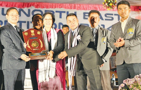 Chef de mission of Manipur N Nirmalata Devi YAS Govt of Manipur receiving the overall team championship trophy from Arunachal Pradesh Chief Minister Nabam Tuki 