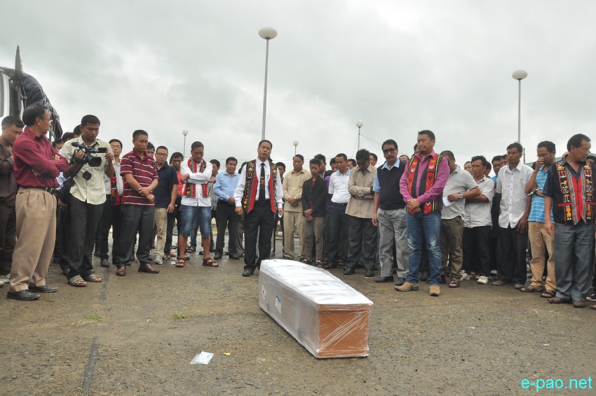 Mortal remains of Akha Shaloni arrives at Imphal Tulihal Airport from Delhi on 23 July 2014