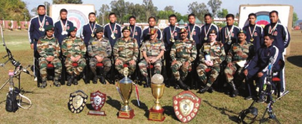 Assam Rifles' archery team pose with the trophies 