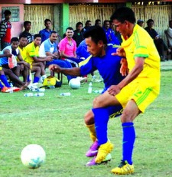 Chiru Sporting Club and 27 Assam Rifles players in action 