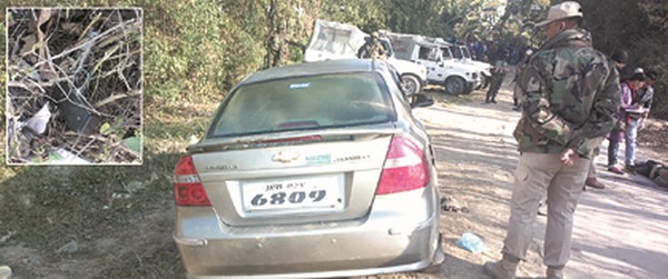 The vehicle used by the suspected militants and the gun found after the shoot out 