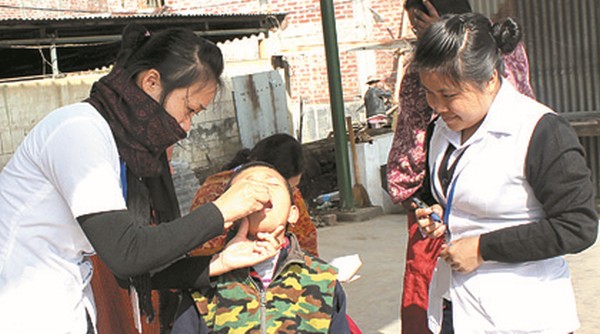 A child being administered pulse Polio drop 