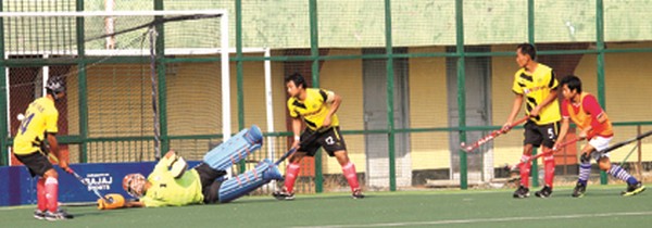 MEIRA goalkeeper dives to save a strike from SSA player 