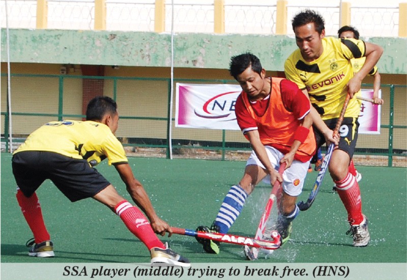 SSA player (middle) trying to break free