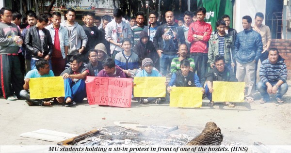 MU students holding a sit-in protest in front of one of the hostels 