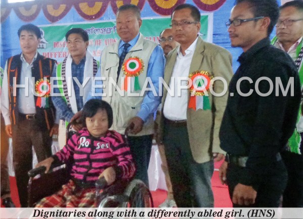 Dignitaries along with a differently abled girl