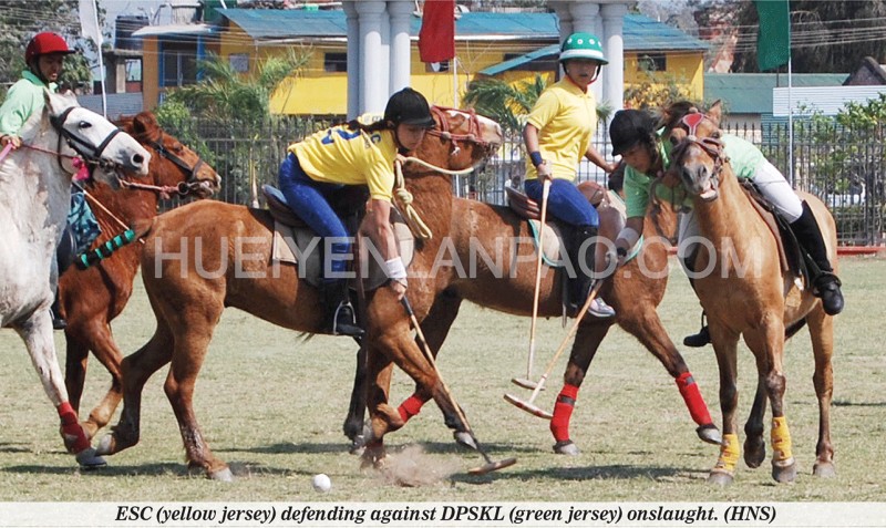 ESC (yellow jersey) defending against DPSKL (green jersey) onslaught