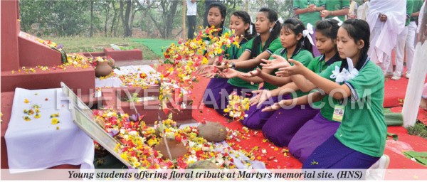 Young students offering floral tribute at Martyrs memorial site
