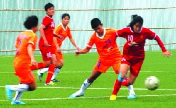 MPSC and YWC players battle for the ball 