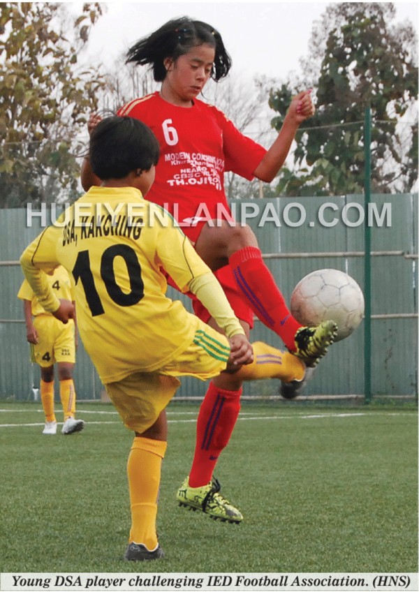 Young DSA player challenging IED Football Association