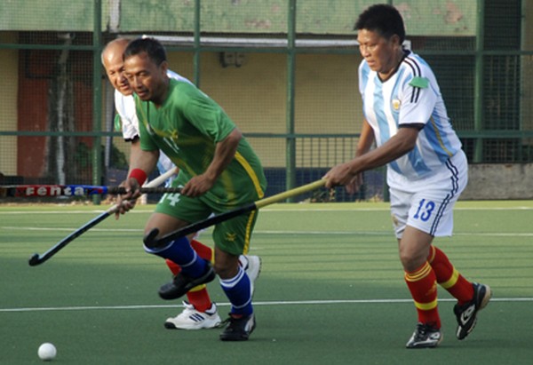 COSMO, Wangkhei and Meiraa, Bashikhong players in action