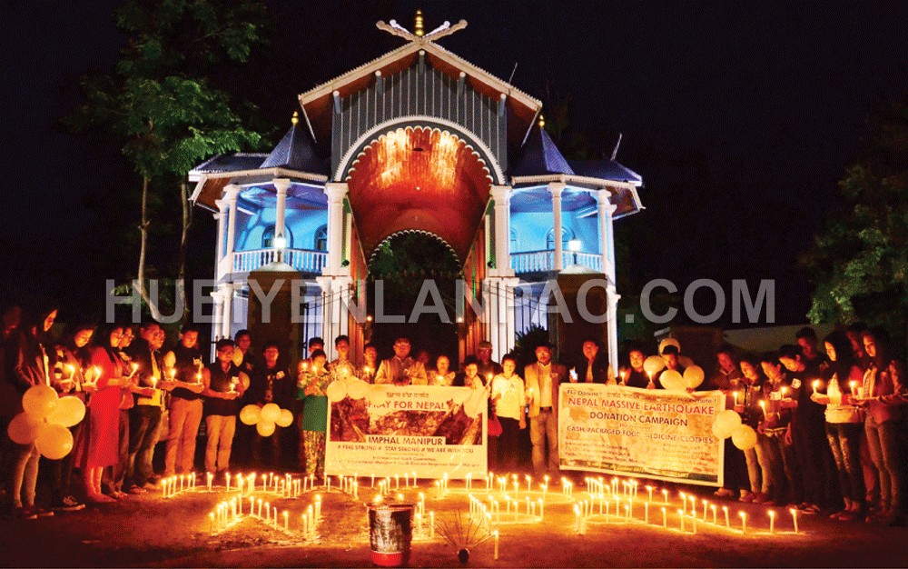 A candlelight tribute to earthquake victims that took numerous lives in Nepal, Bangladesh and India  held at western gate of Kangla