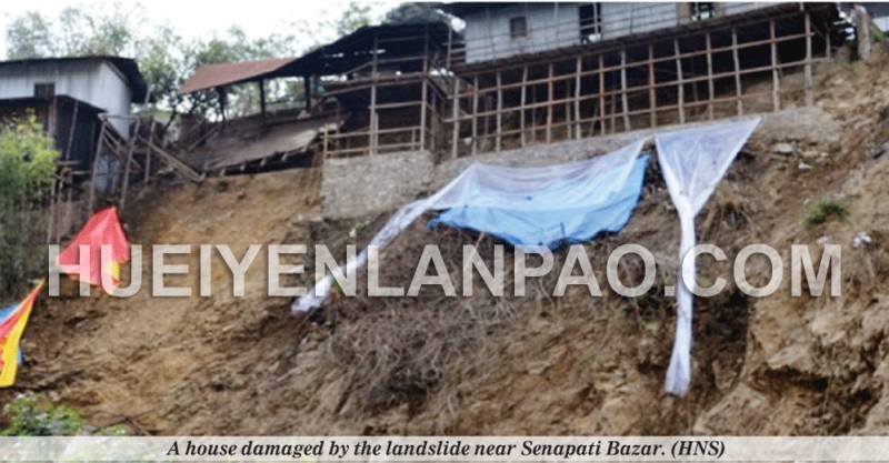 A house damaged by the landslide near Senapati Bazar
