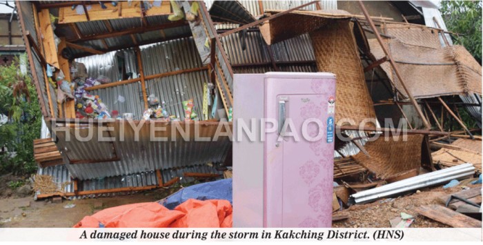 A damaged house during the storm in Kakching District