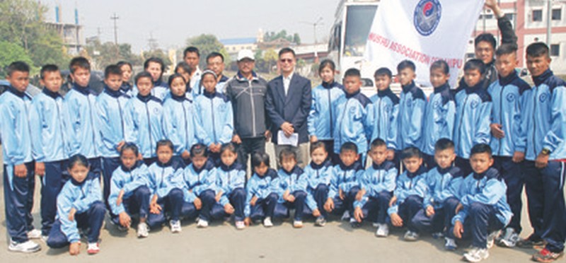 Manipur wushu players pose for a photo 