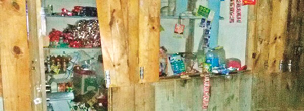 A partially vandalised shop in the violence during the ATCF bandh 