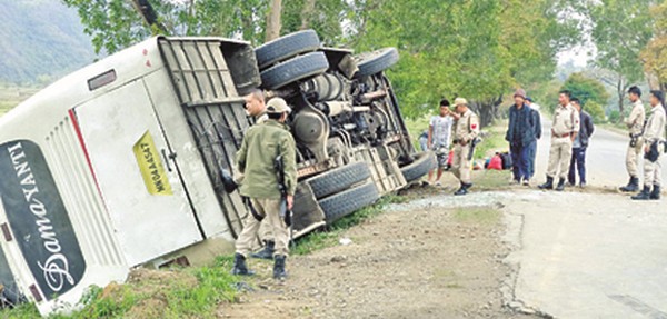 An overturned bus along NH-2