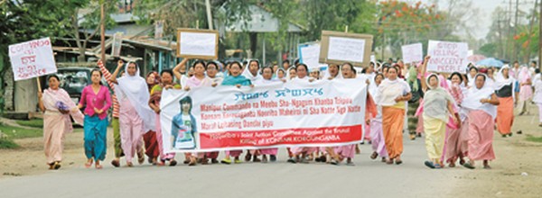 Womenfolk staging a rally against the killing of a youth in police firing on May 19 2015