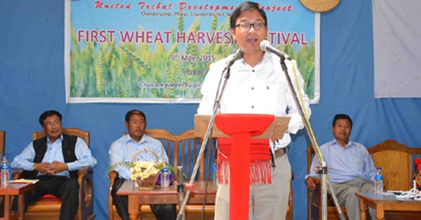 A resource person delivering a speech during the Wheat Harvest Festival