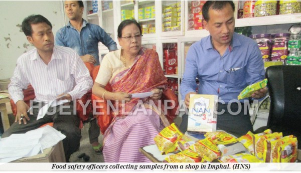 Food safety officers collecting samples from a shop in Imphal