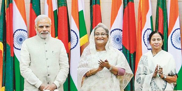PM Narendra Modi, his Bangladeshi counterpart Sheikh Hasina and West Bengal CM Mamata Banerjee