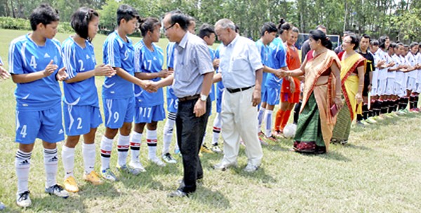 Dignitaries inspecting the players