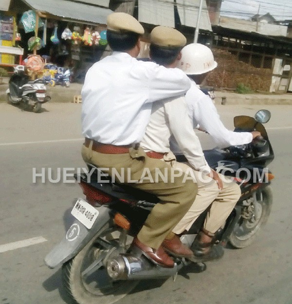 Three traffic policemen flouting rules