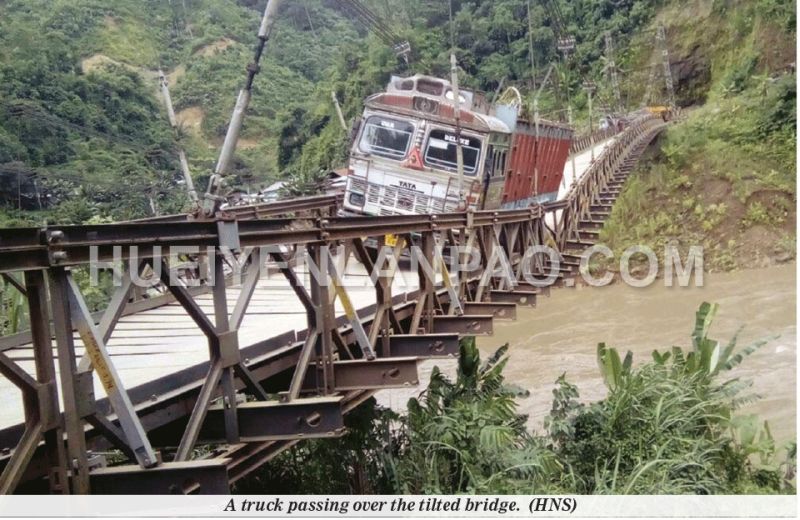 Barak Bridge banks; goods vehicles stopped