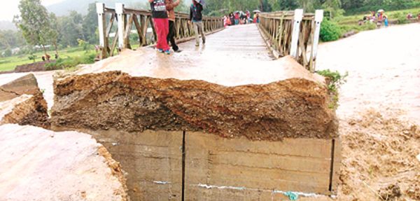 Heavy rain washes away bridge