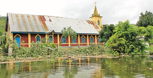A half-submerged church building