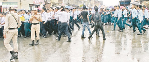 Police confronting the students staging a rally