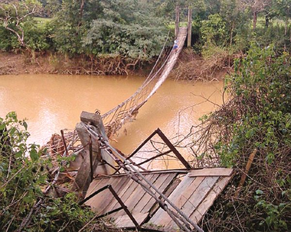 A suspendion bridge ravaged by the recent flood in Chandel district