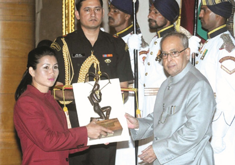 President, Pranab Mukherjee presenting the Arjuna Award for the year-2015 to Y Sanathoi Devi for Wushu