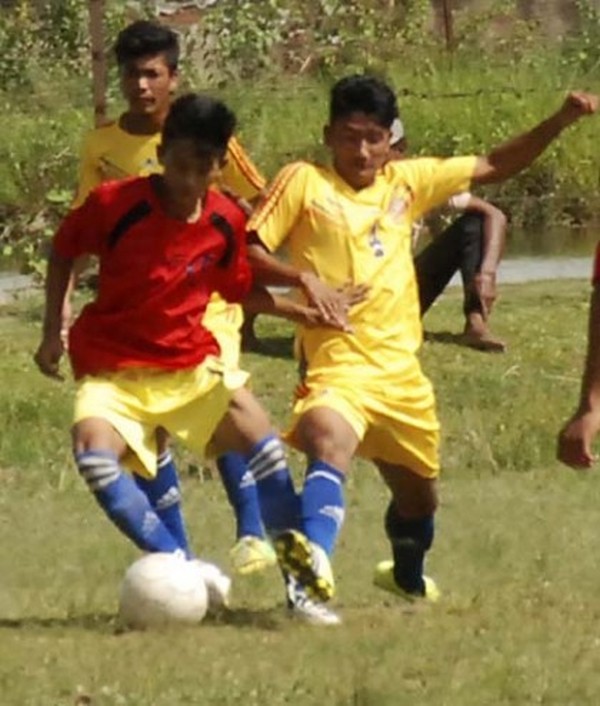 BMSC, Tabungkhok and KSC, Lambulane players vie for the ball
